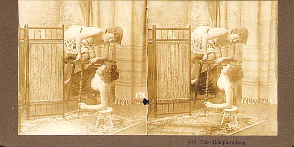 Two Partially Nude Women Playing Masquerade