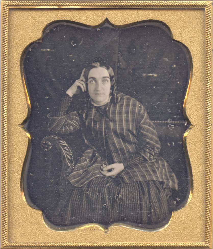 Anonymous - Woman in Plaid Jacket on Sofa Anonymous - Woman in Plaid Jacket on Sofa