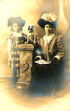 Anonymous - Woman and Girl with Fancy Hats and a Dog on a Column Anonymous - Woman and Girl with Fancy Hats and a Dog on a Column