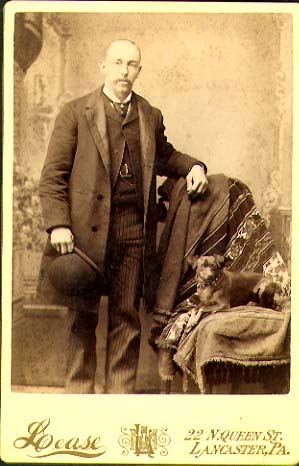 Lease - Man with a Bowler Hat and Dog Lease - Man with a Bowler Hat and Dog