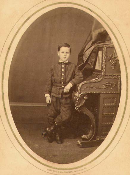 Osborne & Malthaner - Portrait of a Boy at His Piano-like Desk
