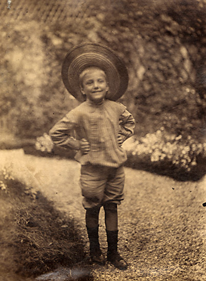 Anonymous - Boy in Staw Hat in Garden